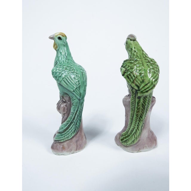 Pair of small Chinese export porcelain birds in green glaze. Slightly different poses and color variation, good condition.