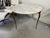 A wonderful Italian Gilt Aluminum and Marble dining table suitable in a Kitchen or small dining room. Very much...