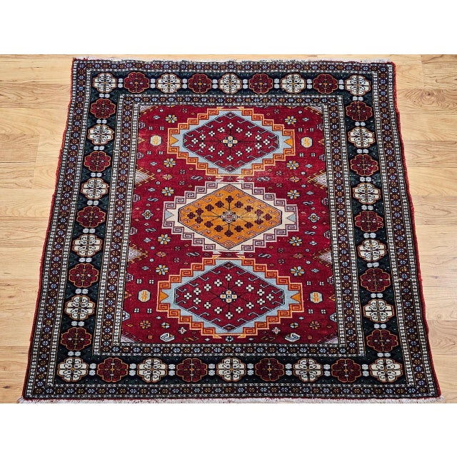 "Truly exceptional and highly sought-after treasure with this Vintage Persian Tribal Area Rug, meticulously hand-knotted...