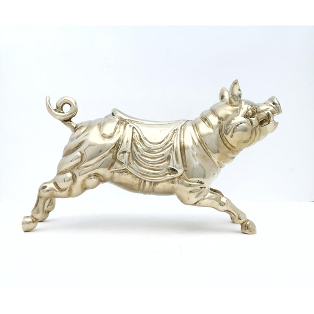 Brass Pig Figurine. This listing is for a brass pig with a saddle figurine. Place this charming piece in any room for...
