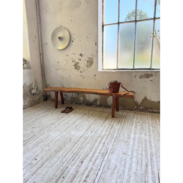 Antique bench in solid blond elm from the French manufacturer Aranjou. We love this unique wood species and its unusual...