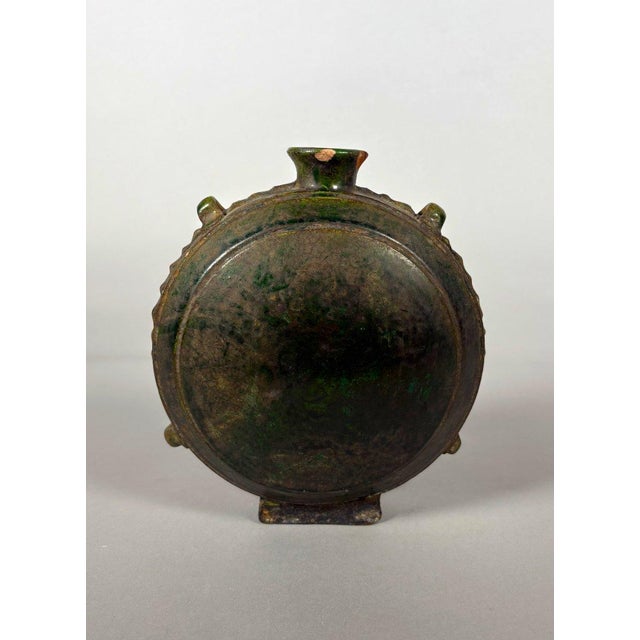 Green glazed earthenware gourd used by nomadic horsemen, China, Tang Dynasty (618-907) For Sale