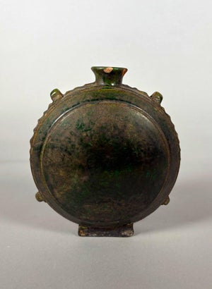 Green glazed earthenware gourd used by nomadic horsemen, China, Tang Dynasty (618-907)