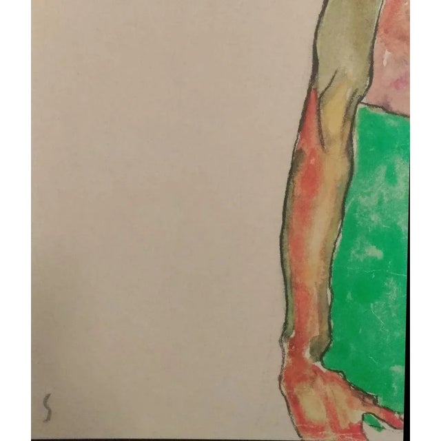 This lithograph from the portfolio ''Egon Schiele'' is a reproduction of ''Mädchen mit grünem Rock'', an original artwork...