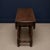 This table features a compact, versatile design with hinged side leaves that can be raised to create a larger surface or...