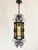 Mid Century Spanish and gothic style wrought iron and amber stain glass tall lantern by the Feldman Co. Los Angeles, CA....
