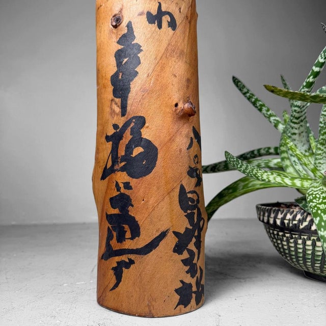 An exceptional Japanese koboku hanaire, made from a naturally hollow piece of wood with a powerful organic form and...