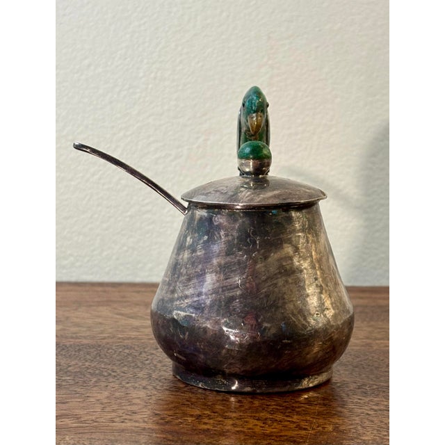 A whimsical and highly collectible 1970s Los Castillo silver plated sugar dish featuring a sculptural parrot handle...
