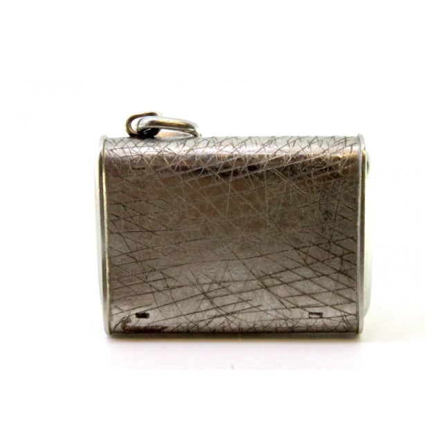 Rectangular Shaped Hand-Wound Pocket Watch with Side-Press Opening Lid, in Very Good conditions. Designed from 2000 This...