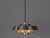 The aluminum Nova lamp, designed by Jo Hammerborg in 1963. When lit, the lamp provides a soft, glare-free downward glow,...
