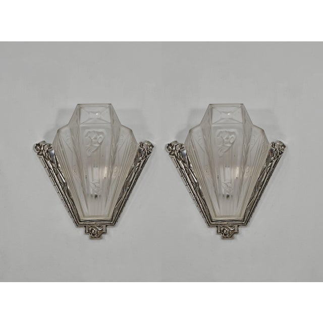 Paul Gilles A wonderful pair of 1930-1935 French art deco wall sconces. The bronze or solid brass mounts hold beautiful...