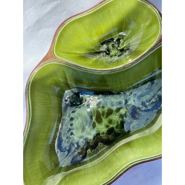 This vintage Treasure Craft serving plate has 2 compartments and has a leaf design . The bottom has a wood design and some...