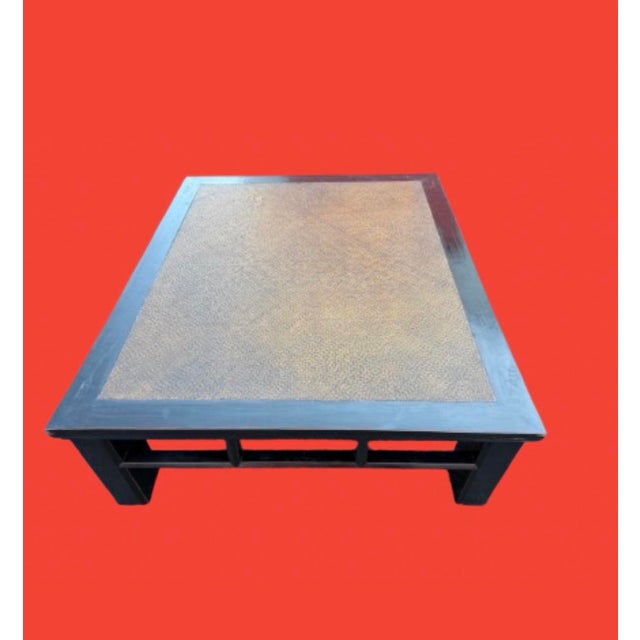 A late Qing Dynasty period elm extra large coffee table from the early 20th century, with square legs, pillar shaped and...