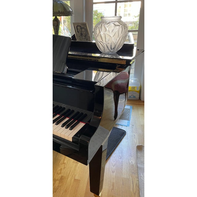 From the esteemed collection of Lind Ronstadt comes this Rene Lalique, "Cigognes" glass vase, model 965, designed circa...