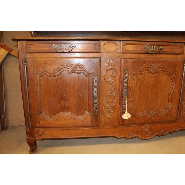 Solid oak sideboard, 18th century, from the Lorraine region In very good condition, beautiful carving quality