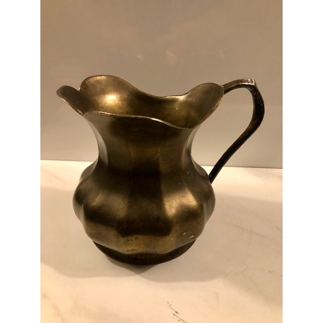 This eye catching 1980s Italian Brass Pitcher / Vase has a lovely scalloped edge and fluted design that makes this an eye...