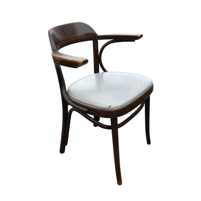 Thonet Style bentwood chair with square seat and rounded corners. The stamped numbers on the inside of the frame of the...