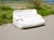Vintage sofa from the late 1970s, foam and white fabric. Very comfortable. Small stains visible on the sides and back. One...