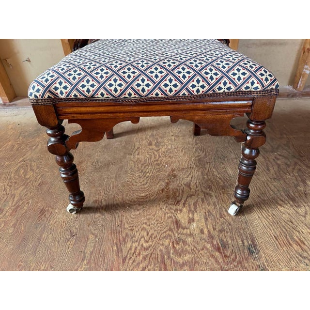 Antique Victorian Gothic Revival and Biedermeier Style Side Chair. It features elaborate spool turnings on the legs and...