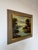 Charming vintage oil painting on canvas depicting a peaceful European countryside river landscape with lush trees, a small...