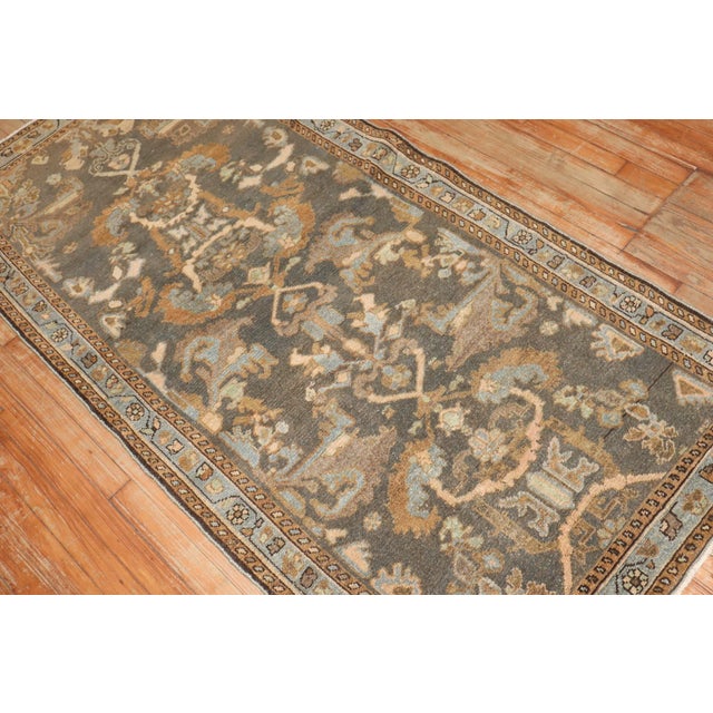 An early 20th century Brown Malayer Small Rug