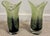 Striking pair of art glass vases featuring a dramatic combination of deep purple and chartreuse green. The sculptural...