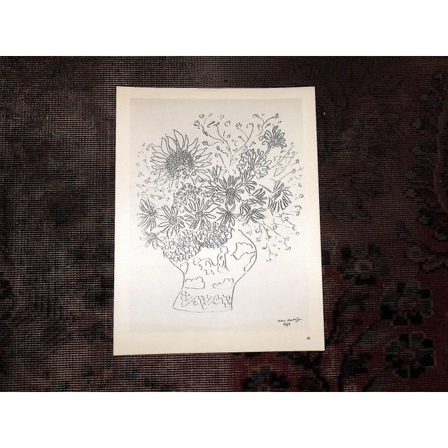 This vintage mid 20th century modernist lithograph (offset) depicts one of Henri Matisse's (France 1869-1954) abstracted...