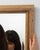 This piece presents as a mirror, distinguished by natural honey wood frame, rectangular. The piece dates to 19th Century,...