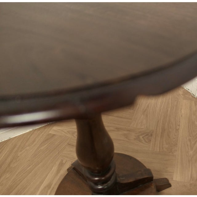 Regency Style Wine Table or Occasional Table This sturdy little table stands on a heavy 3 footed base with an attractive...