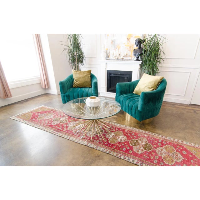 A gorgeous runner decked out with floral geometric motifs. Featuring colors such as brick red for the base, along with...