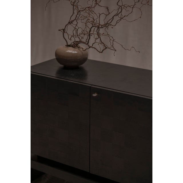 A bold and architectural brutalist sideboard, model atalanta, designed by j. Batenburg for mi in the 1970s. The piece is...