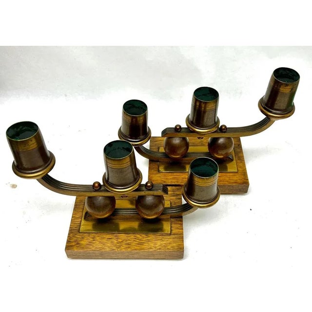 Art Deco Wooden Base and Brass Candlestick whit Wooden Details, 1930s. Cleaned and polished the wood has also been waxed....