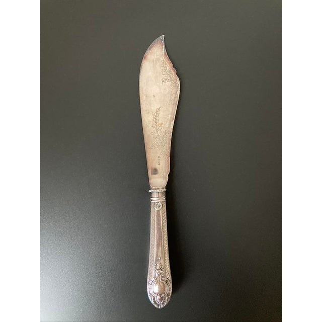 A beautiful English cake knife in silverplate and Art Nouveau detailing, circa early 20th century, England, Europe. Piece...