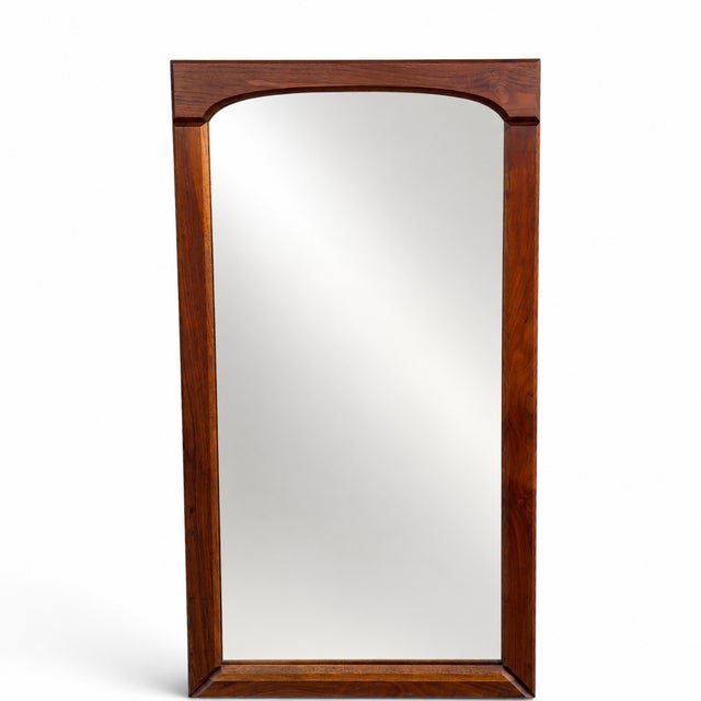 A documented matching pair of mid-century modern wall mirrors by Brown-Saltman Co. of Gardena, California. Each mirror is...