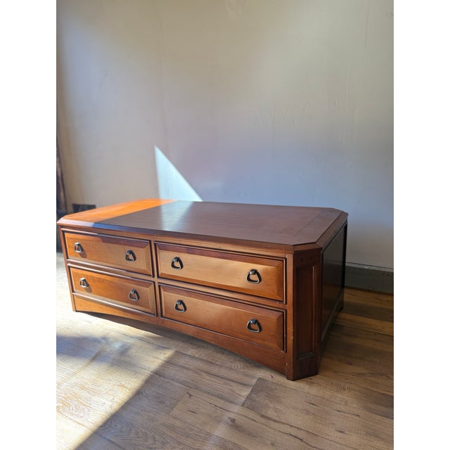 This gorgeous authentic Thomasville coffee table is in incredible condition, with perfectly smooth drawers and a cherry...