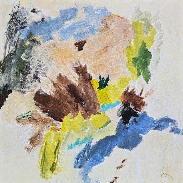 When painting, the artist wipes off her brush on a folded paper towel, before rinsing it and going to another color....