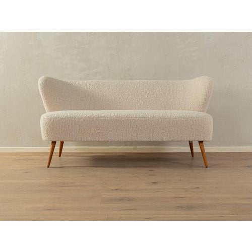 Charming cocktail sofa Very good workmanshipHigh-quality materialsMade in Germany Seat Height: 47.0 cm Width: 155 cm...
