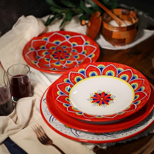 The Intreccio Red 4-Piece Place Setting brings centuries of Italian ceramic artistry to your table. Hand-painted by master...