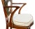 With shield back and painted Prince of Wales plume over a pair of arms, serpentine caned seat raised on tapered circular...