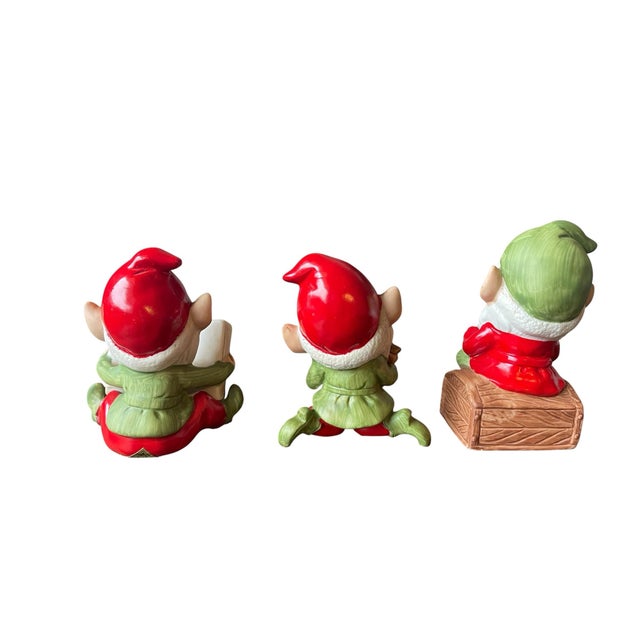 This adorable set of figurines is made of hand-painted porcelain bisque and was released in 1982. Each elf is stamped with...