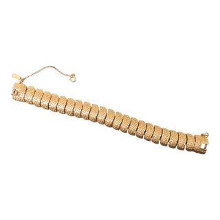 Vintage 1963 Signed Monet Goldtone Textured Link Bracelet For Sale