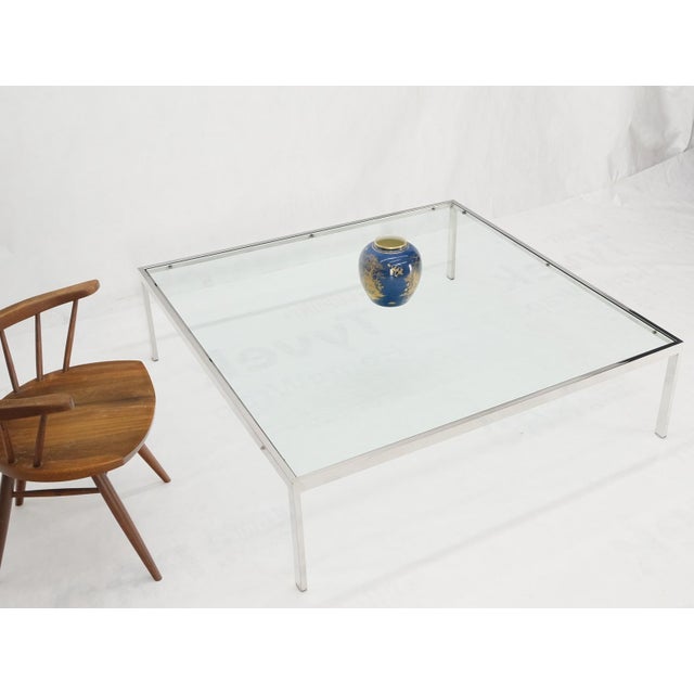 Mid-Century Modern large chrome polished stainless steel glass top square coffee table. Measure: 54".