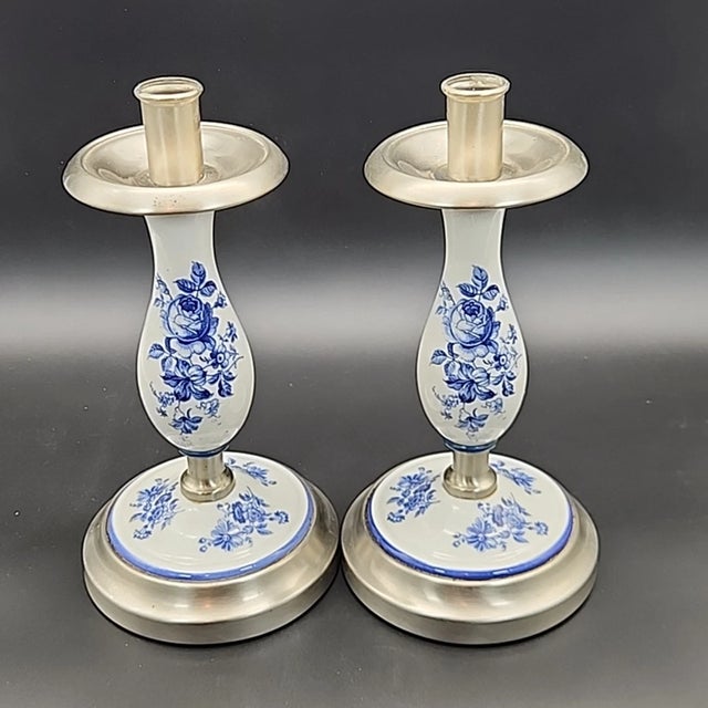 Add classic European charm to your décor with this Set of 2 Vintage Delft Blue Ceramic & Pewter Candlestick Holders....