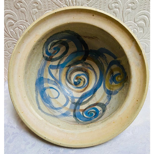 A beautiful huge studio pottery bowl by the well known potter Susan Anderson, dated 1993. Truly a statement piece to add...