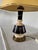 An elegant Art Deco table lamp dating from the 1920s-1940s. This distinctive piece combines the delicacy of glazed...