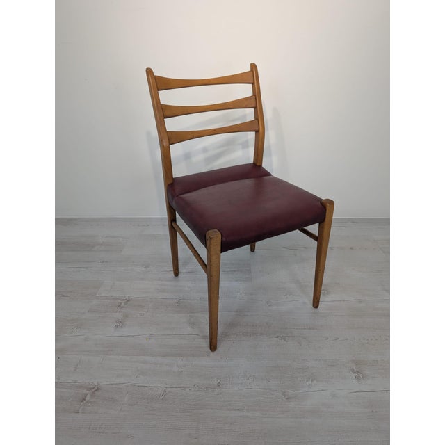 Danish Teak Chair from the 1960s This chair is made of exotic teak wood and is manufactured in Denmark. The seat is...