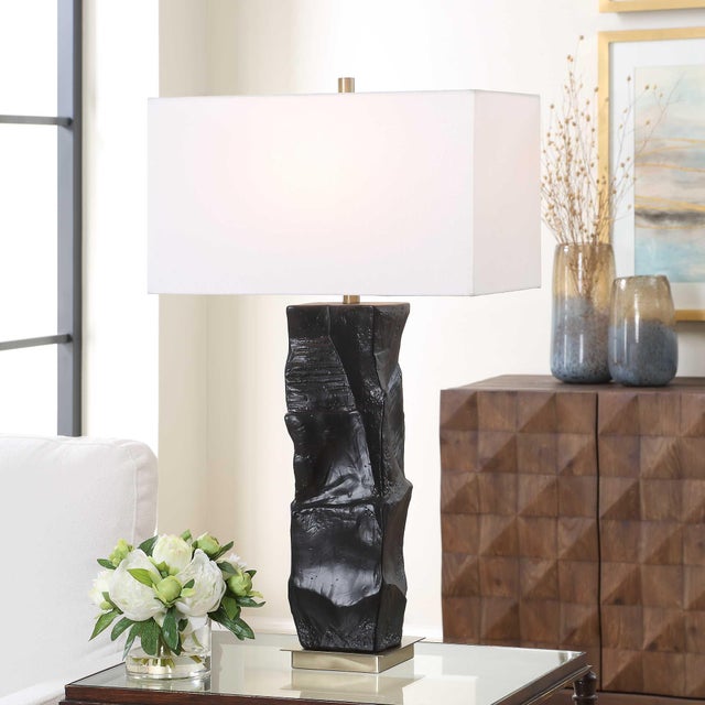 This Eye-catching Ceramic Table Lamp Is A Perfect Blend Of Artistry And Function. It Features A Uniquely Textured Base...