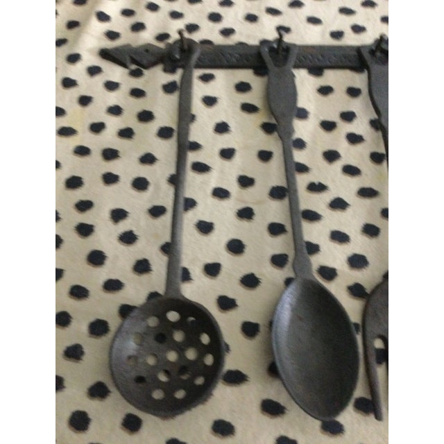 Farmhouse 1960s Vintage Hand Made Cast Iron Utensils With a Matching Decorative Wall Hanger - 4 Pieces For Sale - Image 3 of 7