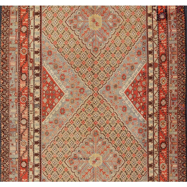 Islamic Large Antique Khotan Gallery Rug With Layered Diamond Design in Yellow, Orange, Brown & Gray For Sale - Image 3 of 5