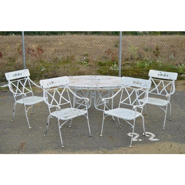 Vintage Wrought Iron Salterini Style Garden Patio Dining Set - 5 Pc Set. Set includes 4 curule armchairs with cut-out leaf...